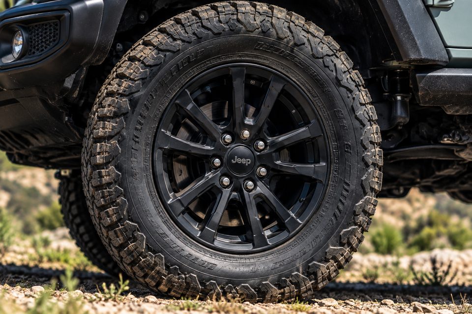 Wheels: off-road tyre and black alloy wheel